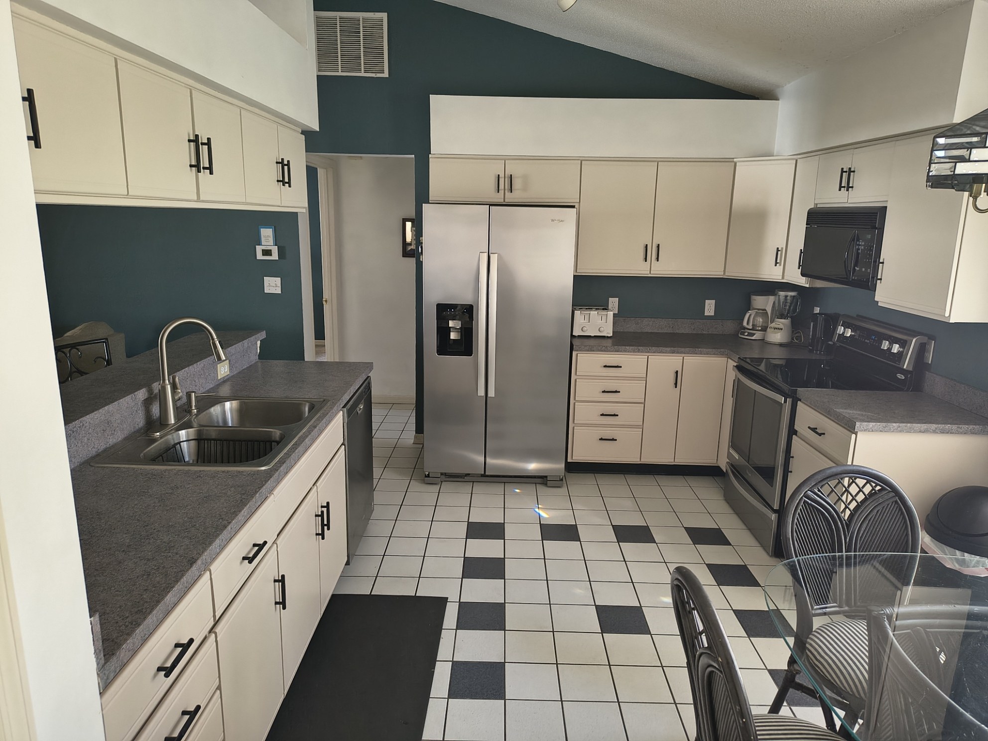 Kitchen and breakfast bar at Florida Fun Villa