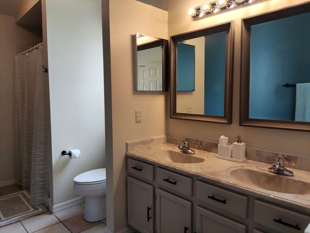 Bathroom with vanity at Florida Fun Villa